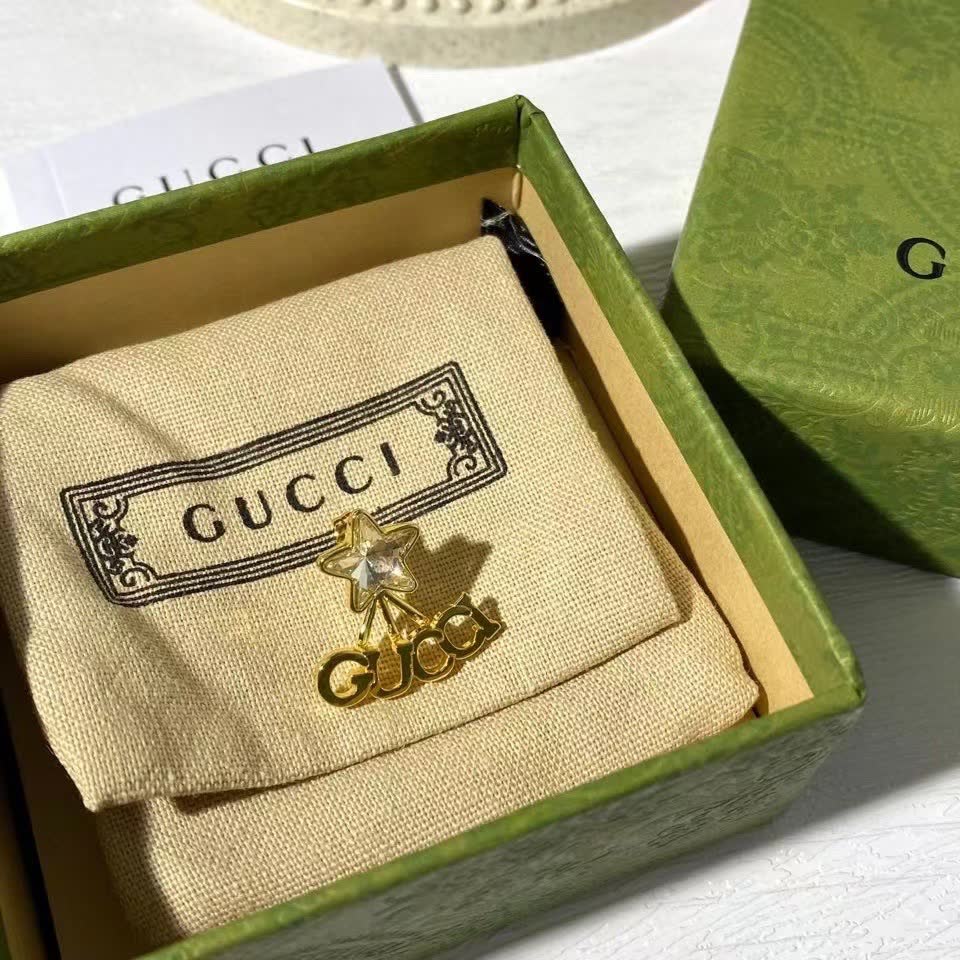 Gucci Gold Star and Letter Earrings
