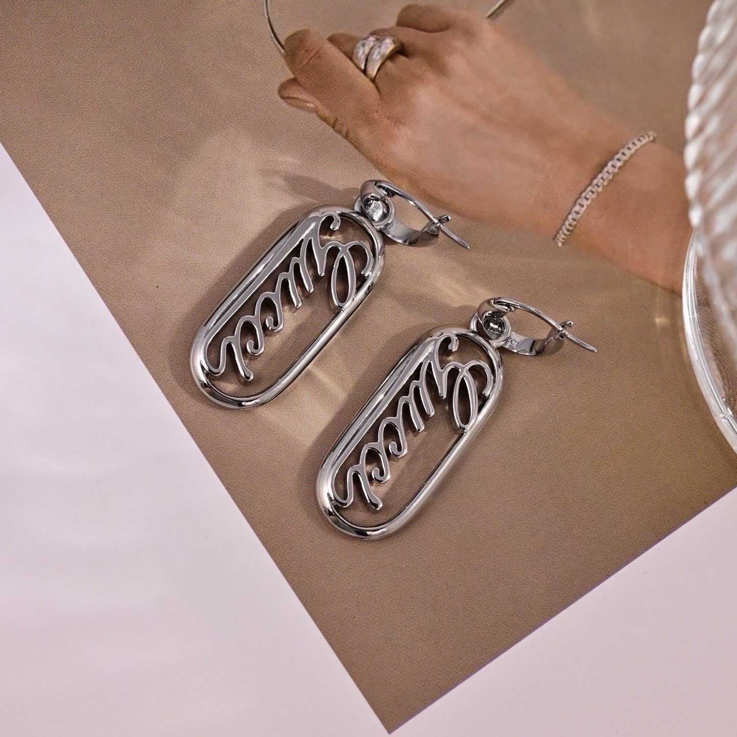 Gucci Silver 'GG' Logo Earrings