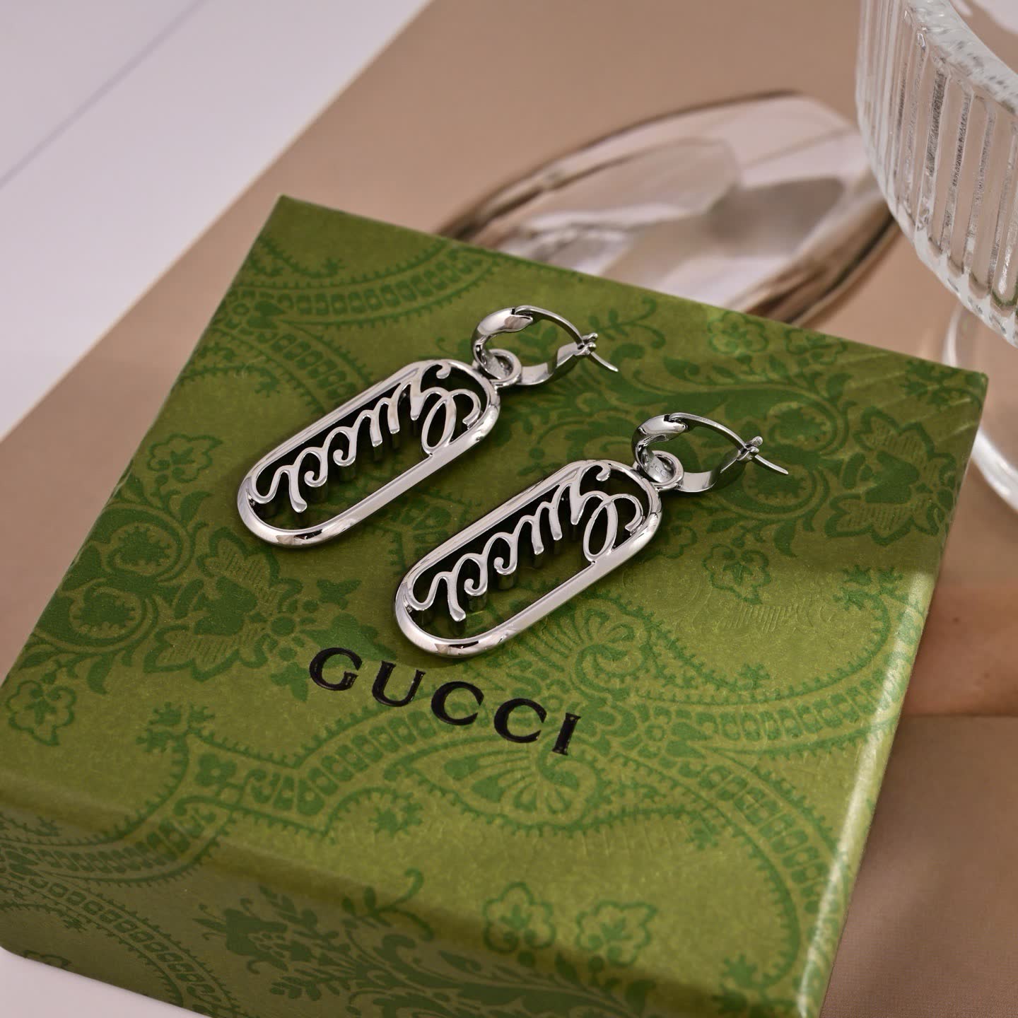 Gucci Silver 'GG' Logo Earrings