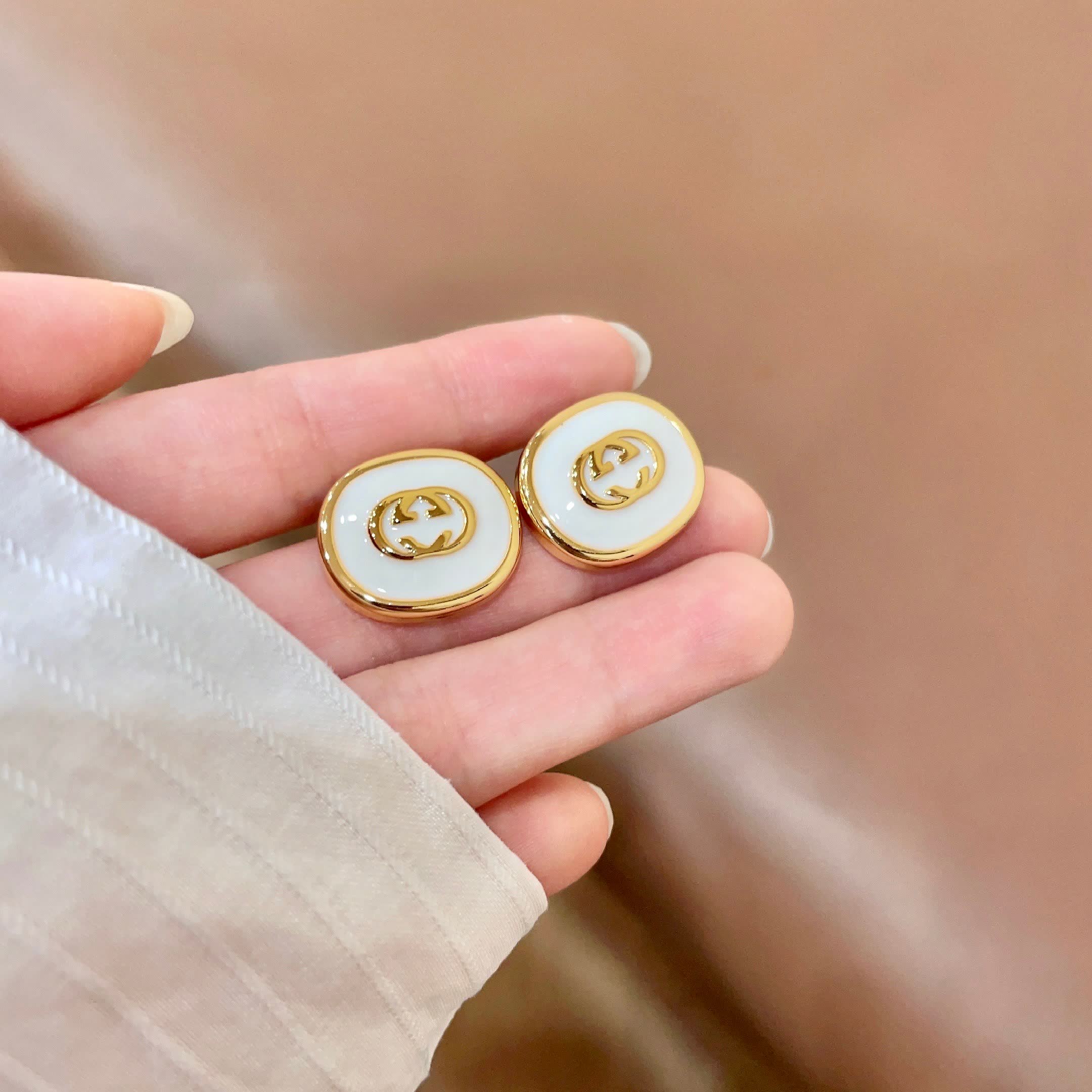 Chanel Gold and White Enamel Stud Earrings
