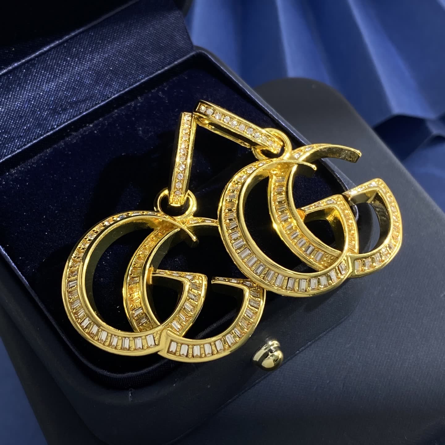 Gucci Gold Tone 'GG' Logo Earrings