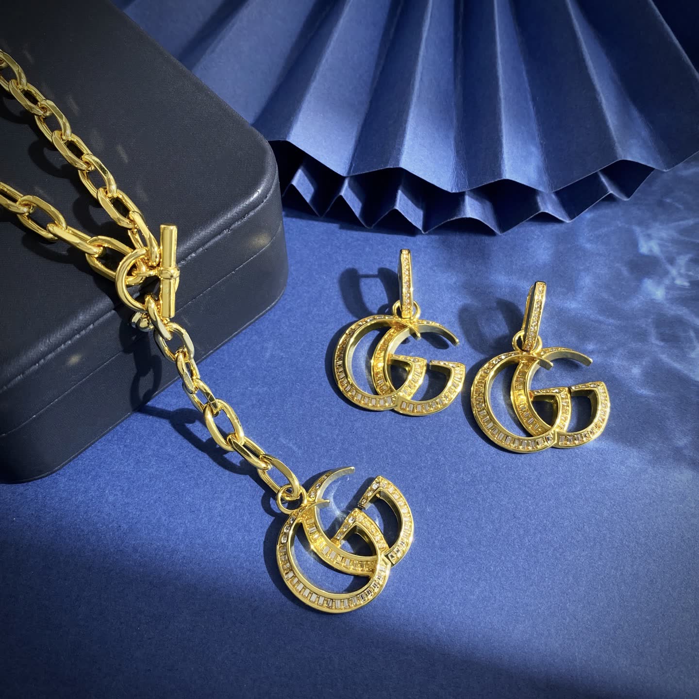 Gucci Gold Tone 'GG' Logo Earrings