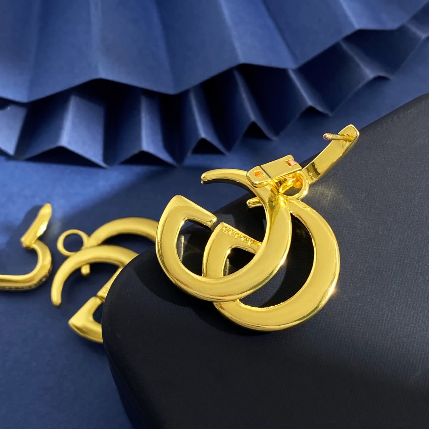Gucci Gold Tone 'GG' Logo Earrings