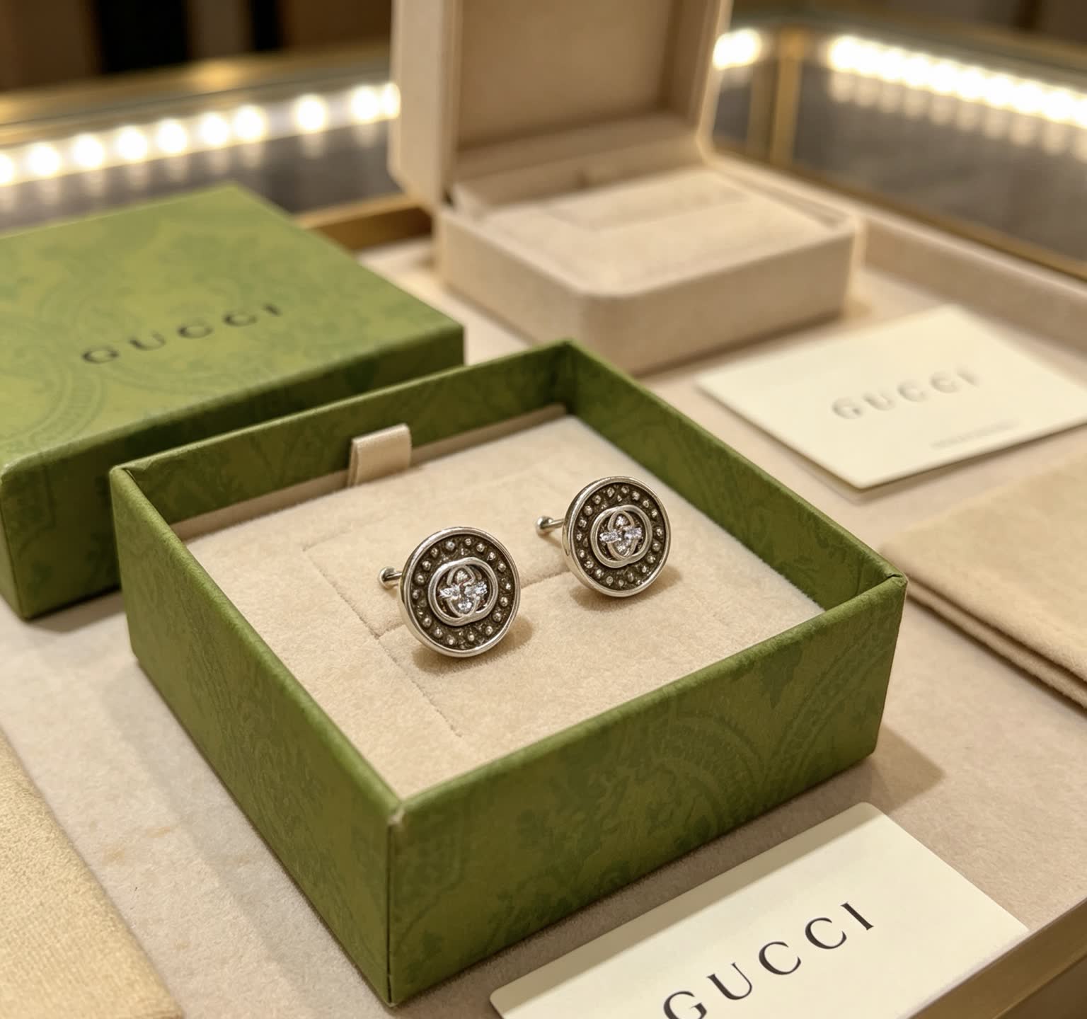 Gucci Silver Tone Round Stud Earrings with Crystal Accents Gucci Silver Tone Round Stud Earrings with Crystal Accents