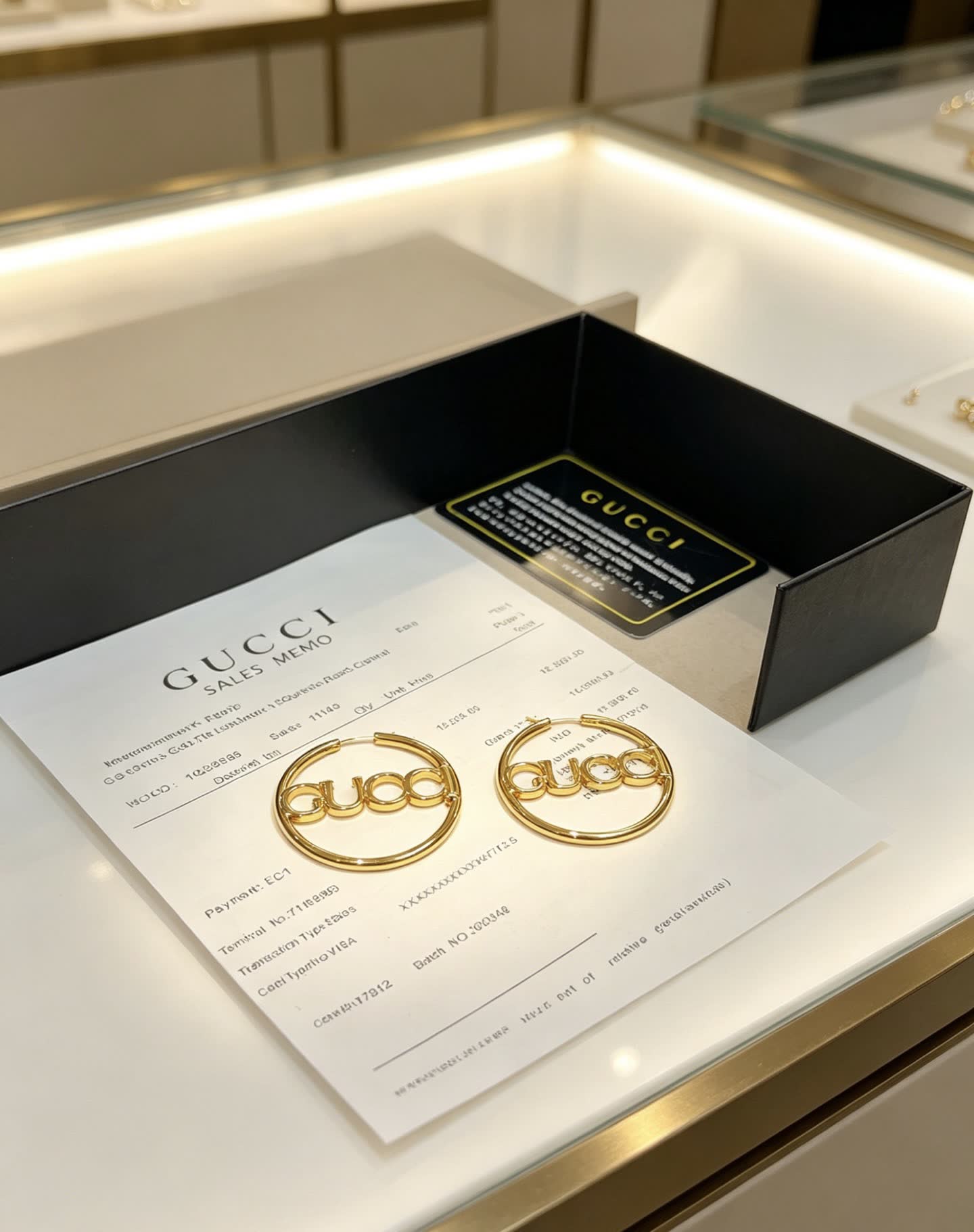Gucci Logo Hoop Earrings