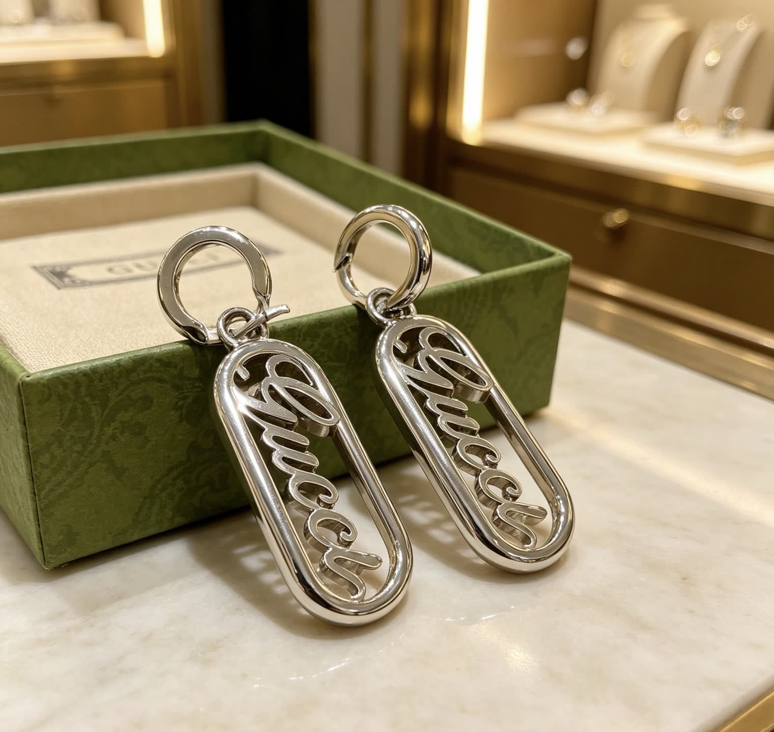 Gucci Silver Logo Earrings