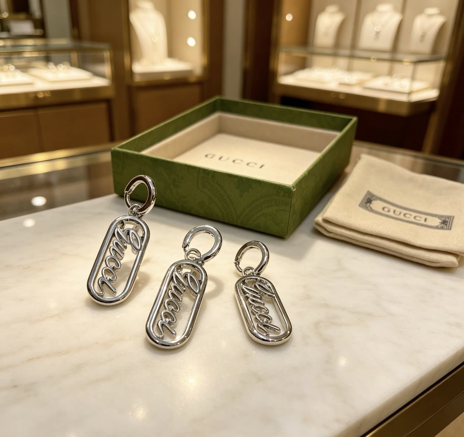 Gucci Silver Logo Earrings