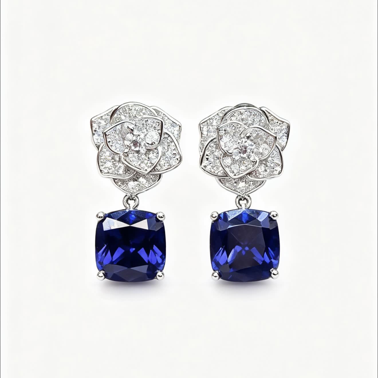 Piaget Elegant Blue Gemstone and Diamond Earrings
