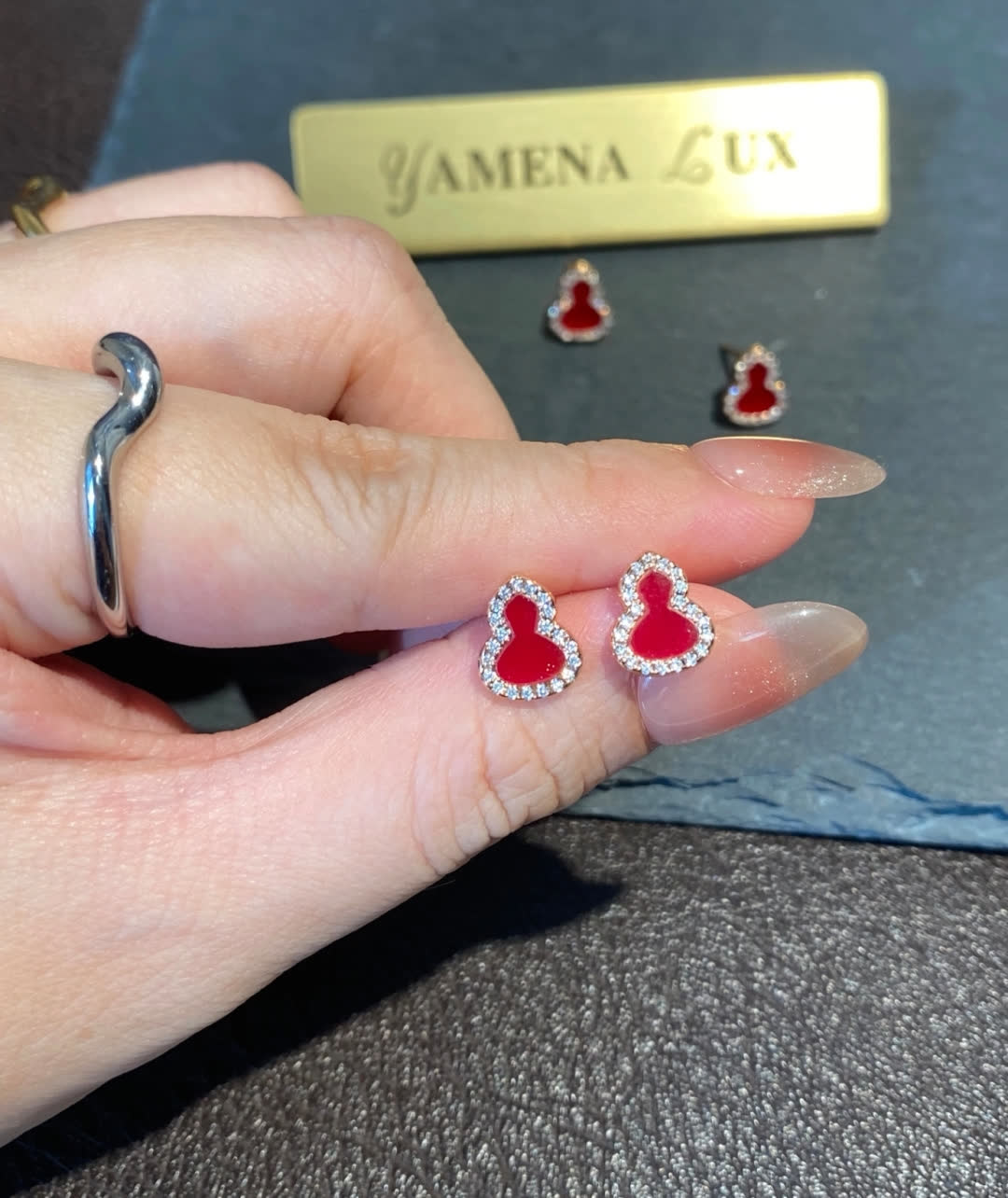 Qeelin Gold Buddha Stud Earrings with Red Enamel