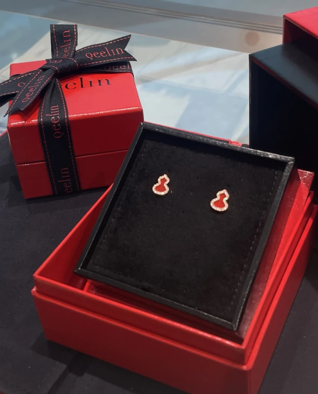 Qeelin Gold Buddha Stud Earrings with Red Enamel