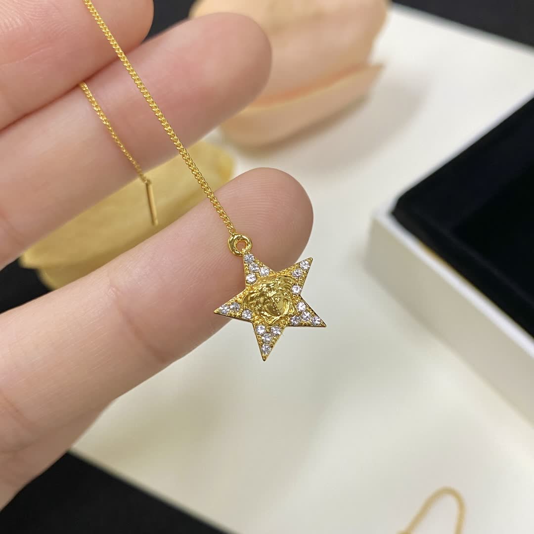 Versace Gold Star Dangle Earrings