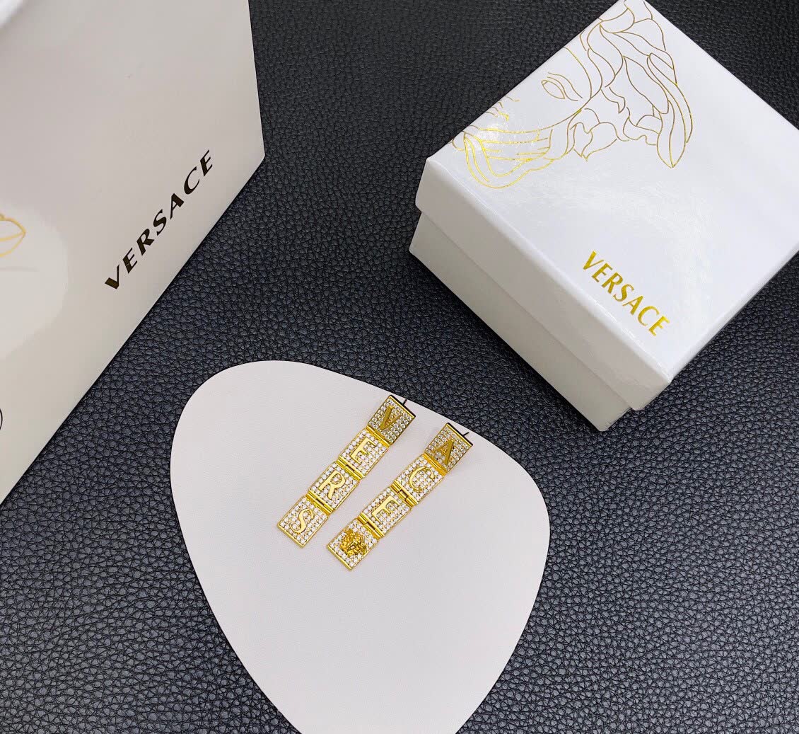 Versace Elegant Gold-Tone Pearl Necklace and Earring Set