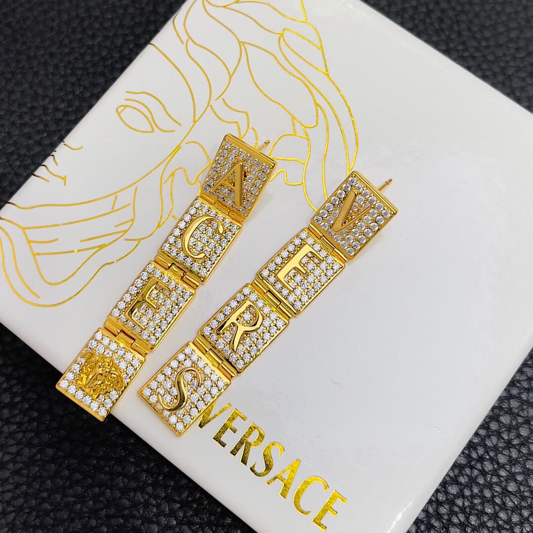 Versace Elegant Gold-Tone Pearl Necklace and Earring Set