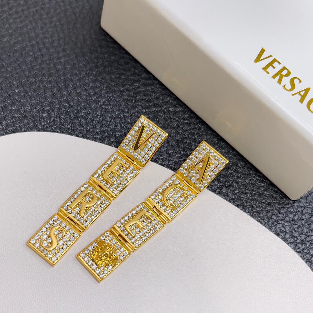 Versace Elegant Gold-Tone Pearl Necklace and Earring Set
