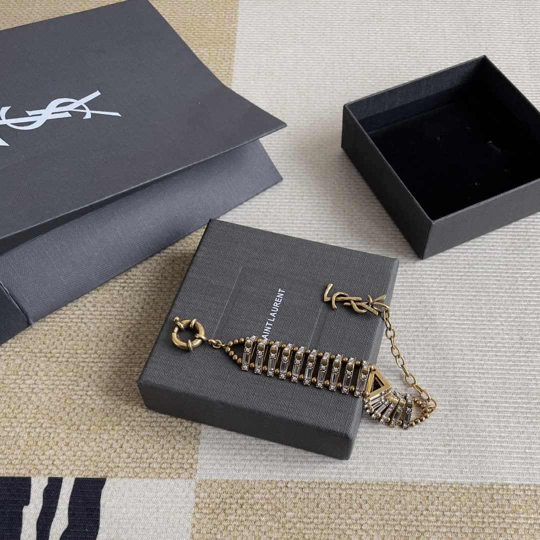 Yves Saint Laurent Earrings - Gold Tone with Rhinestones
