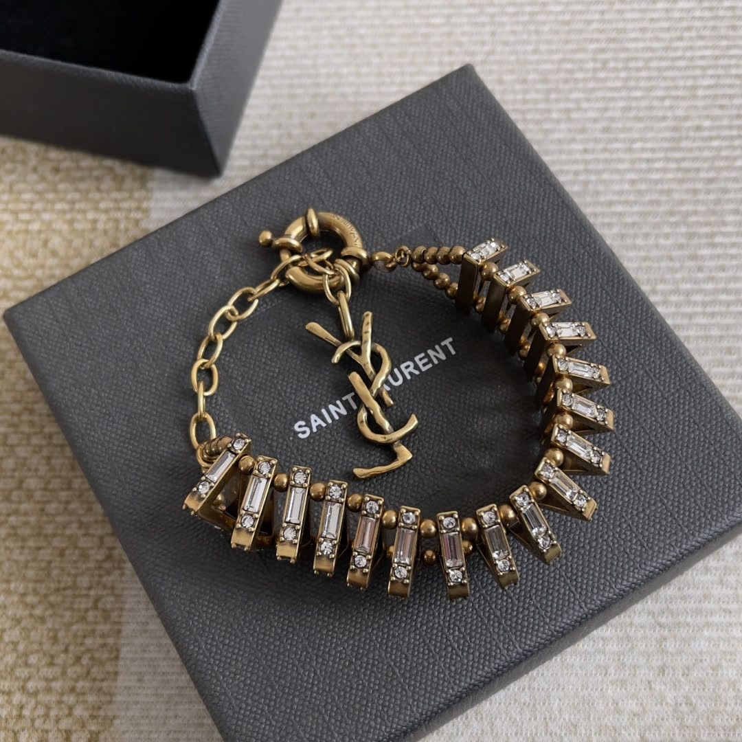 Yves Saint Laurent Earrings - Gold Tone with Rhinestones