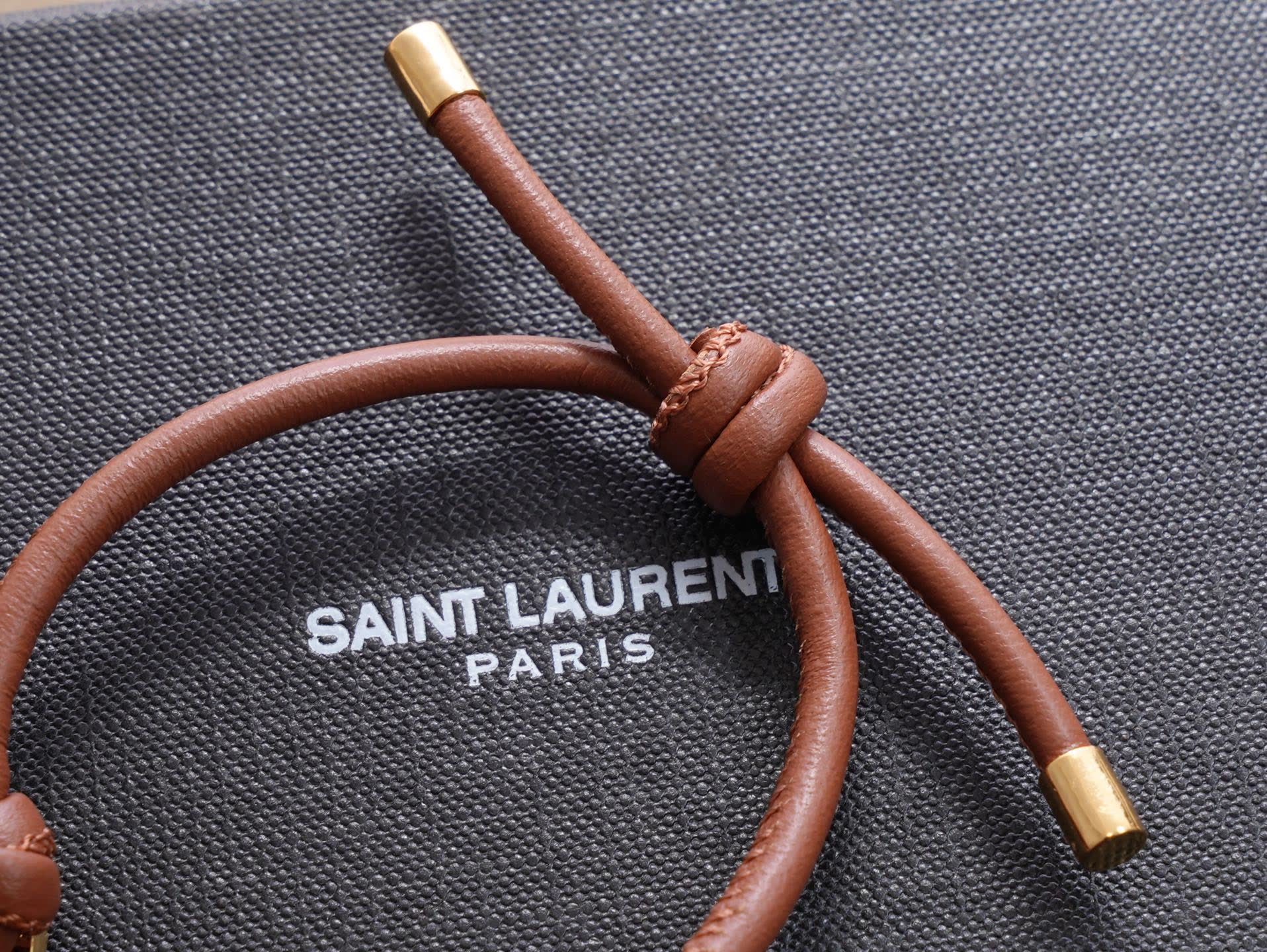 Saint Laurent Leather Bracelet with Gold Logo