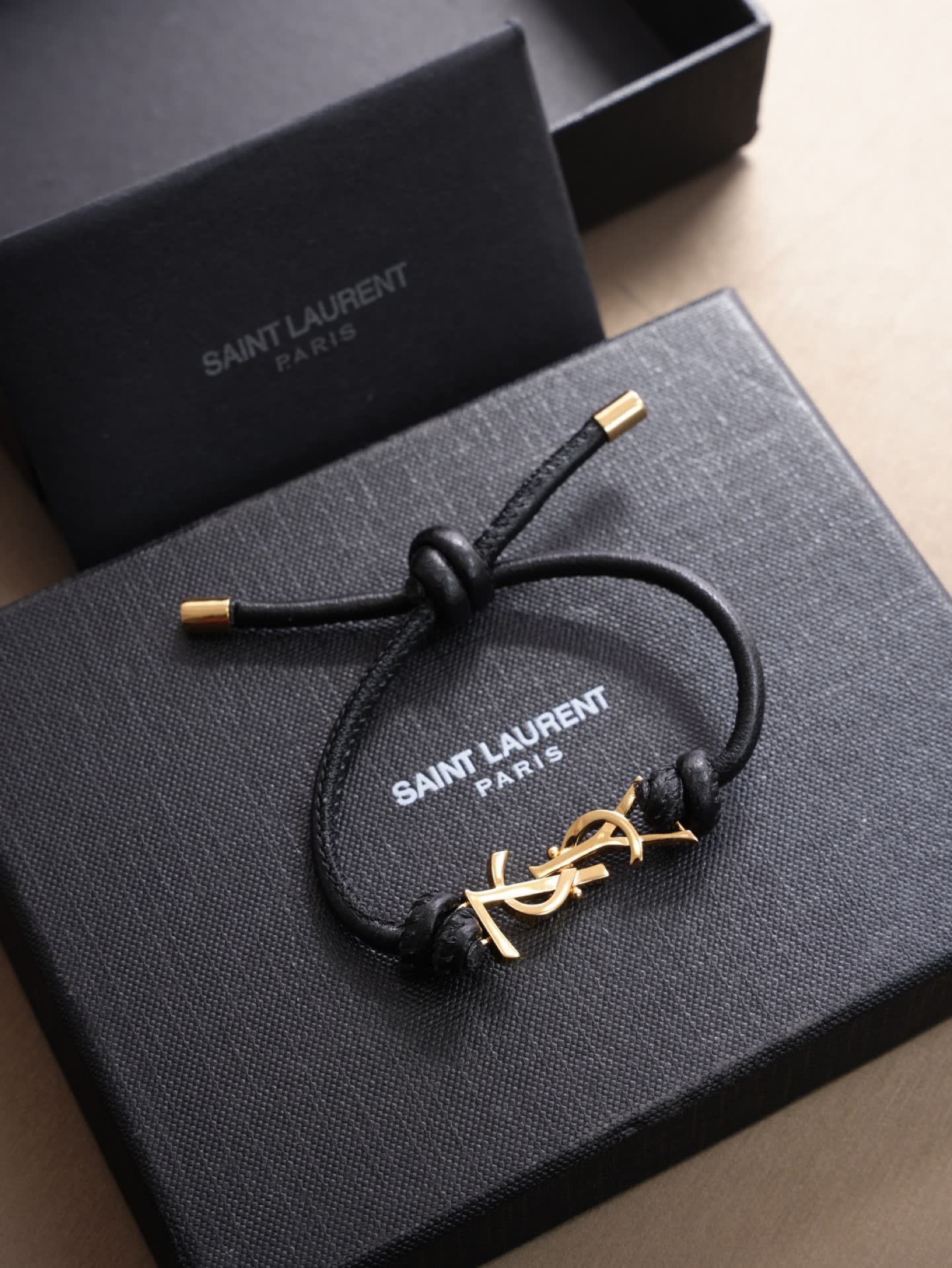 Saint Laurent Leather Bracelet with Gold Logo