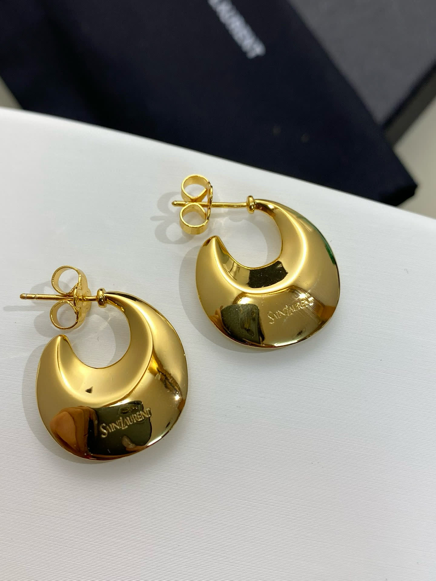 YSL Saint Laurent Gold Crescent Hoop Earrings YSL Saint Laurent Gold Crescent Hoop Earrings