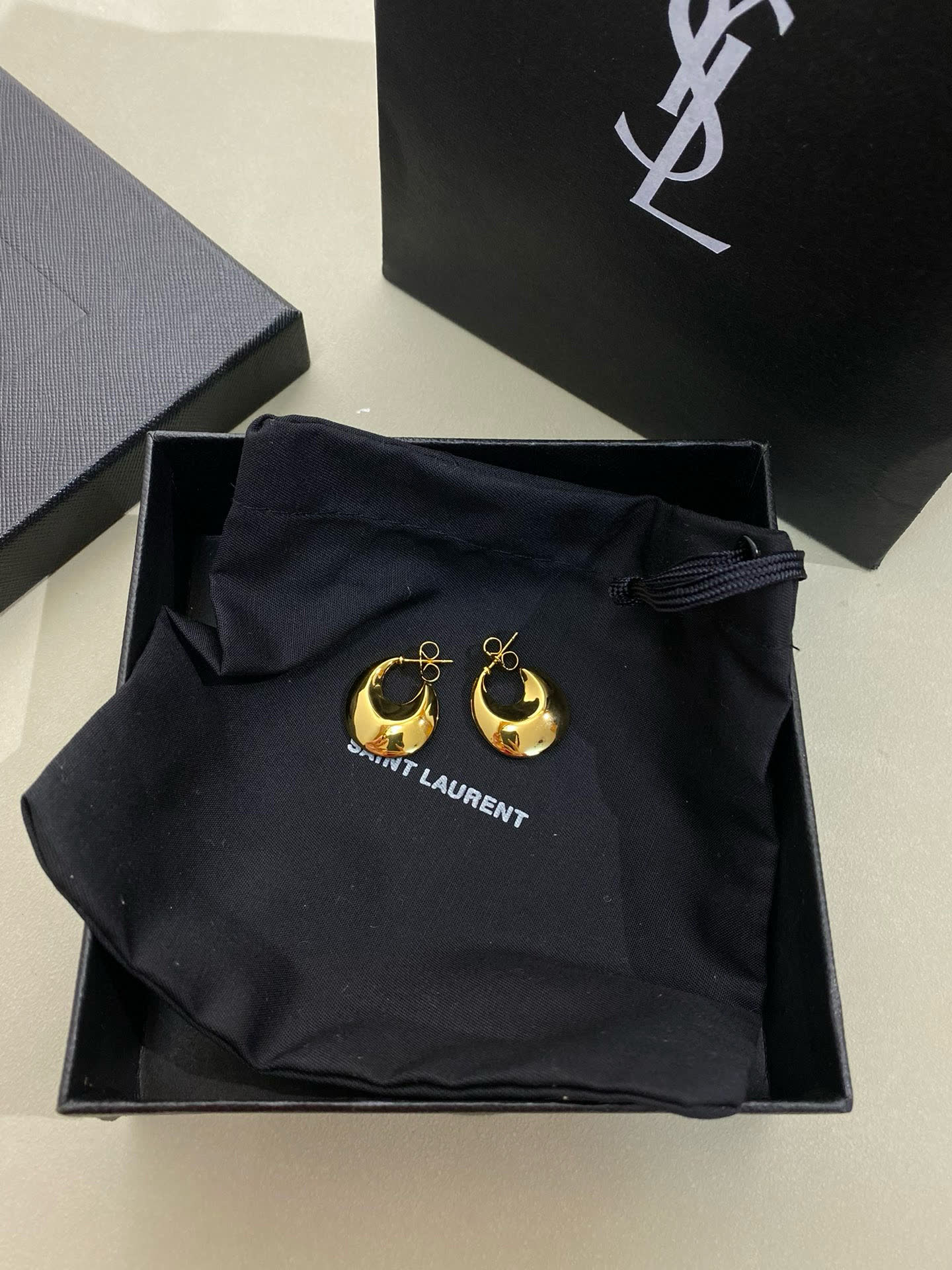YSL Saint Laurent Gold Crescent Hoop Earrings