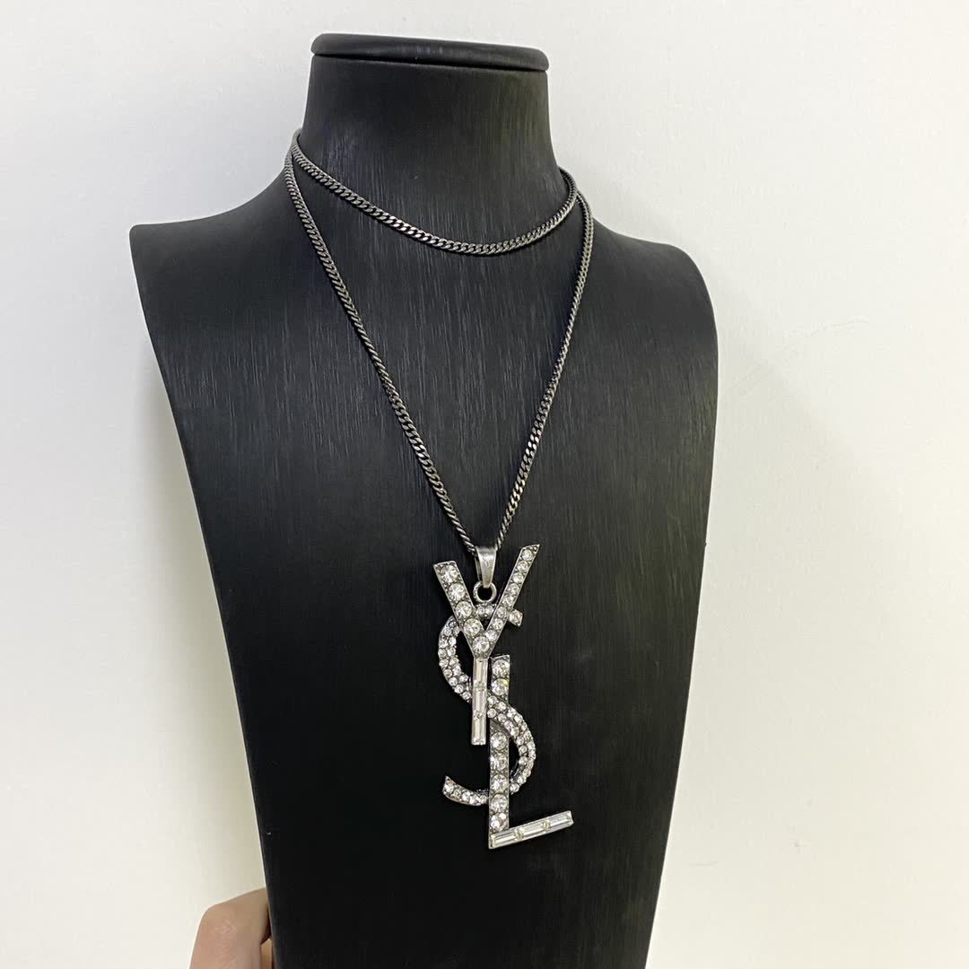 YSL Silver Tone Crystal Embellished Logo Earrings YSL Silver Tone Crystal Embellished Logo Earrings