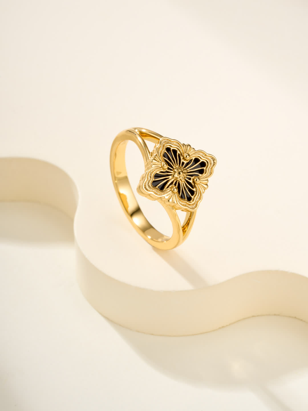 Buccellati Elegant Gold Ring with Black Enamel Flower Design