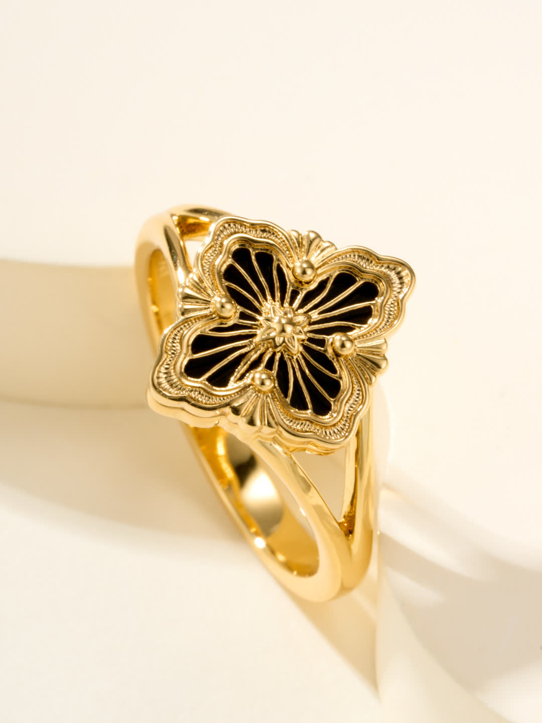 Buccellati Elegant Gold Ring with Black Enamel Flower Design