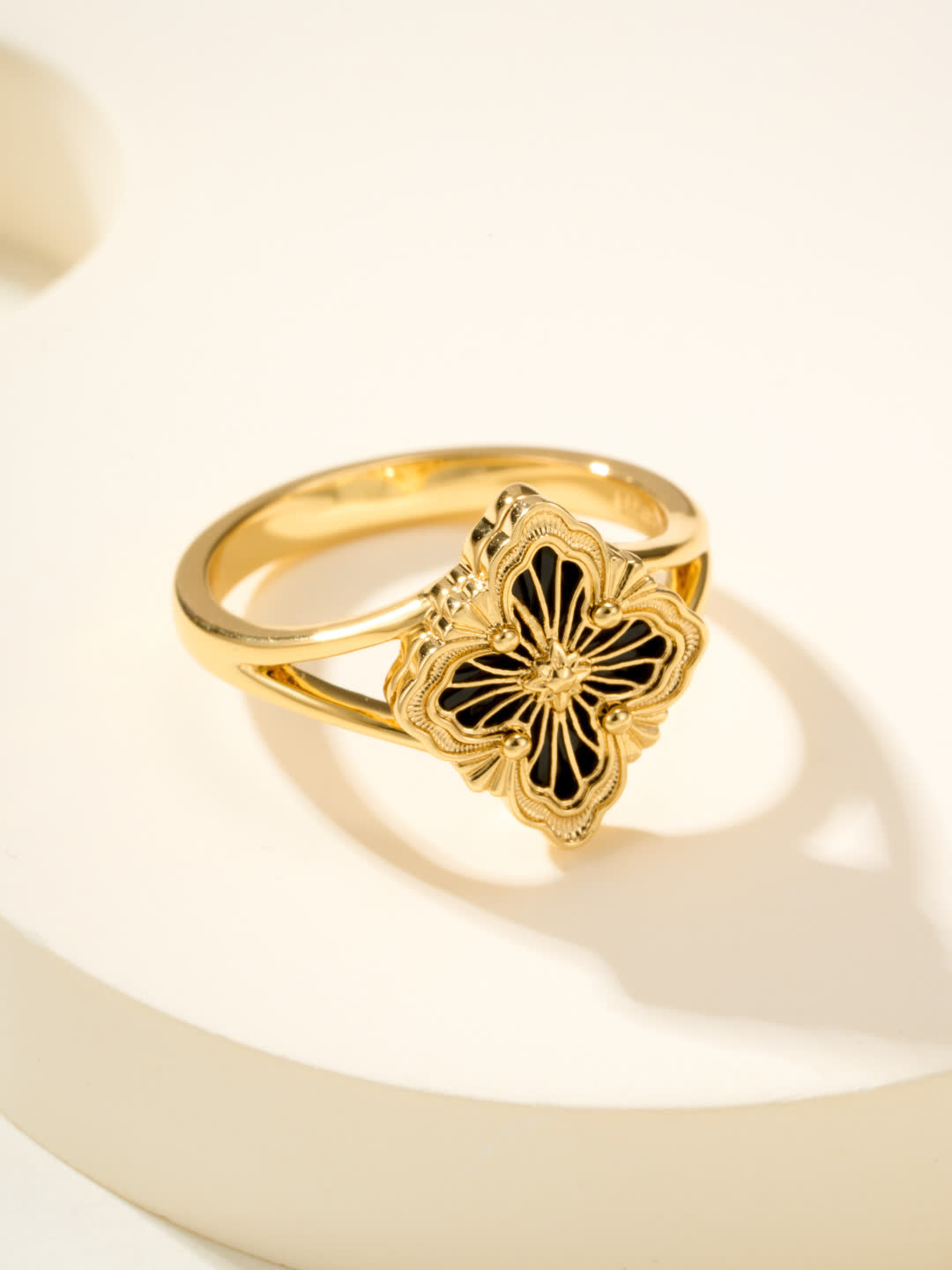 Buccellati Elegant Gold Ring with Black Enamel Flower Design