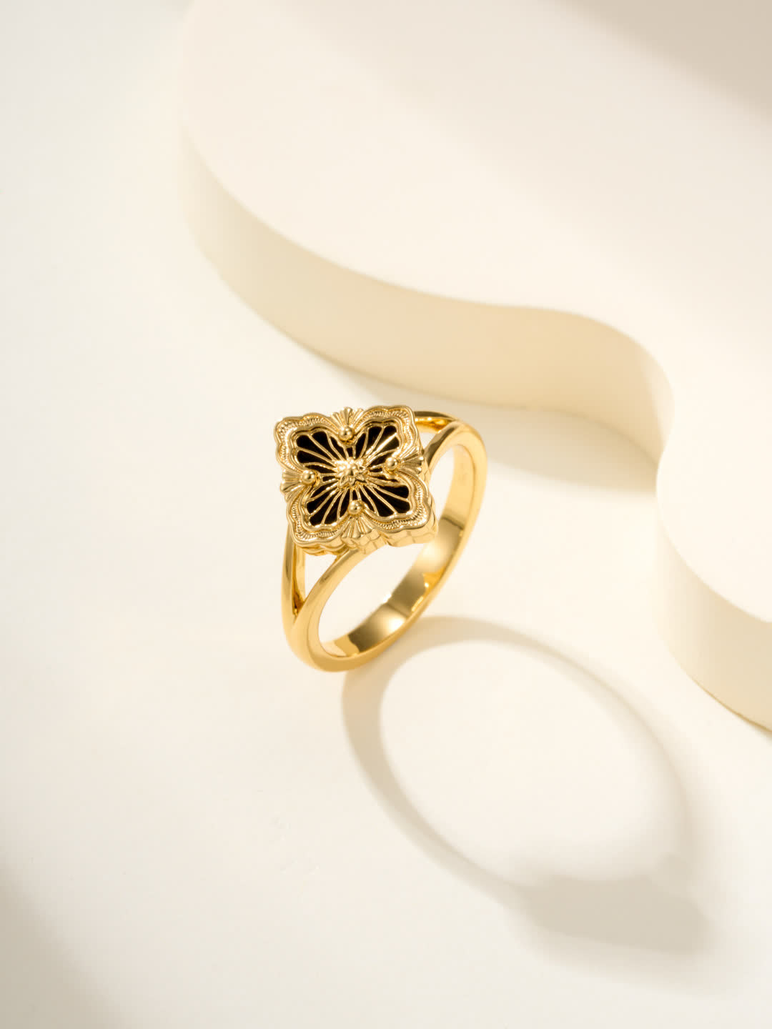 Buccellati Elegant Gold Ring with Black Enamel Flower Design