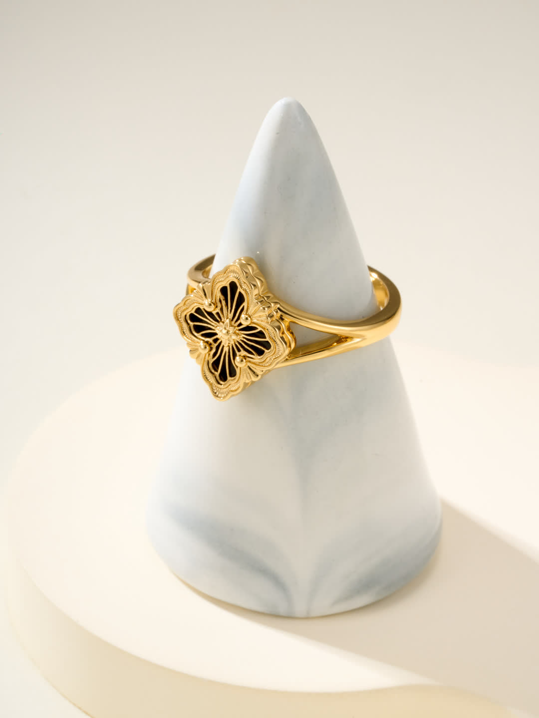 Buccellati Elegant Gold Ring with Black Enamel Flower Design