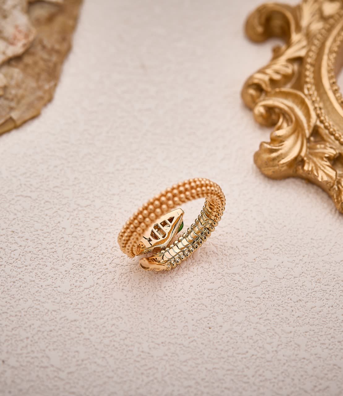Bvlgari Gold Ring with Emerald and Diamond Accents
