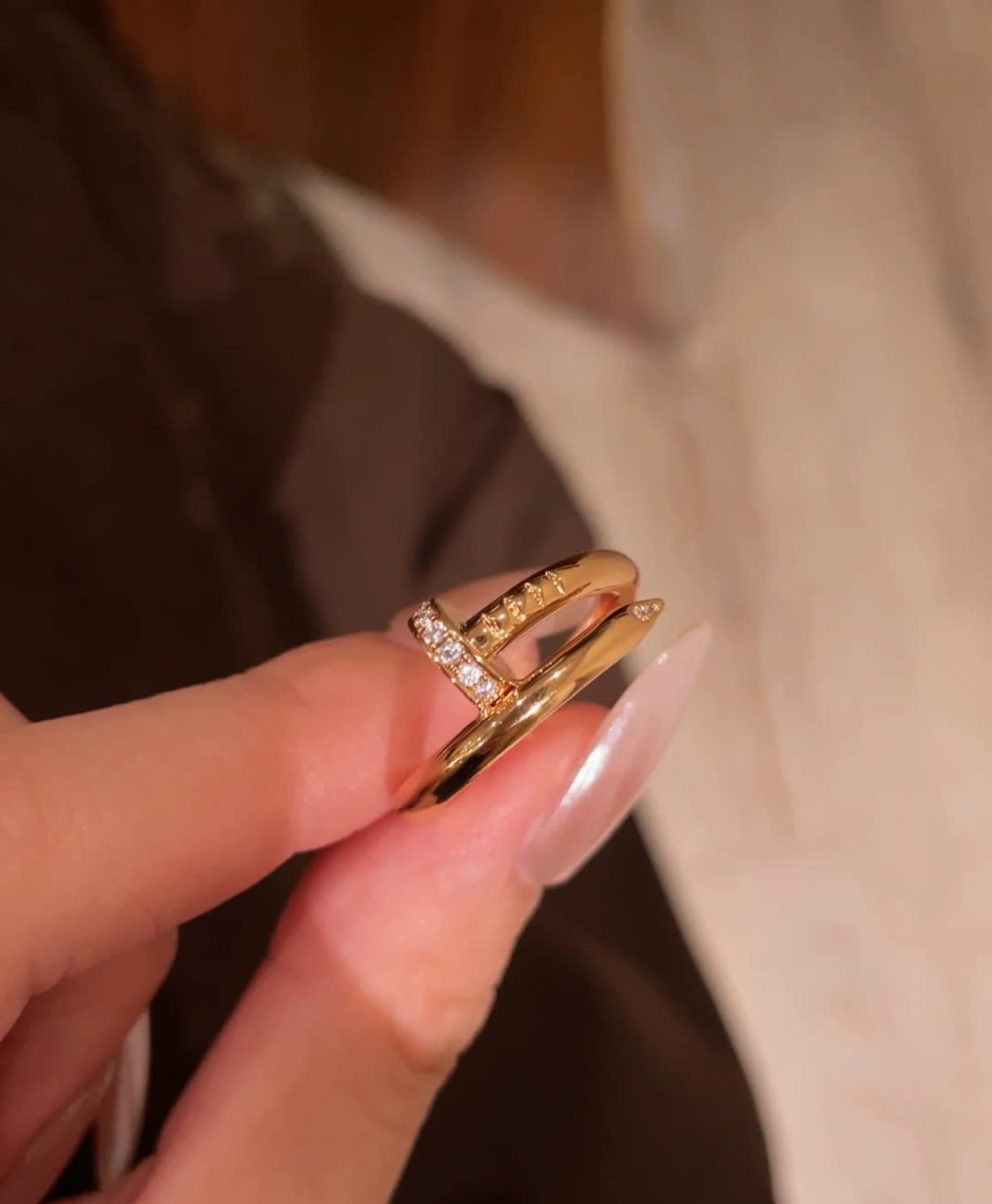 Cartier Elegant Gold Ring with Diamond Accents