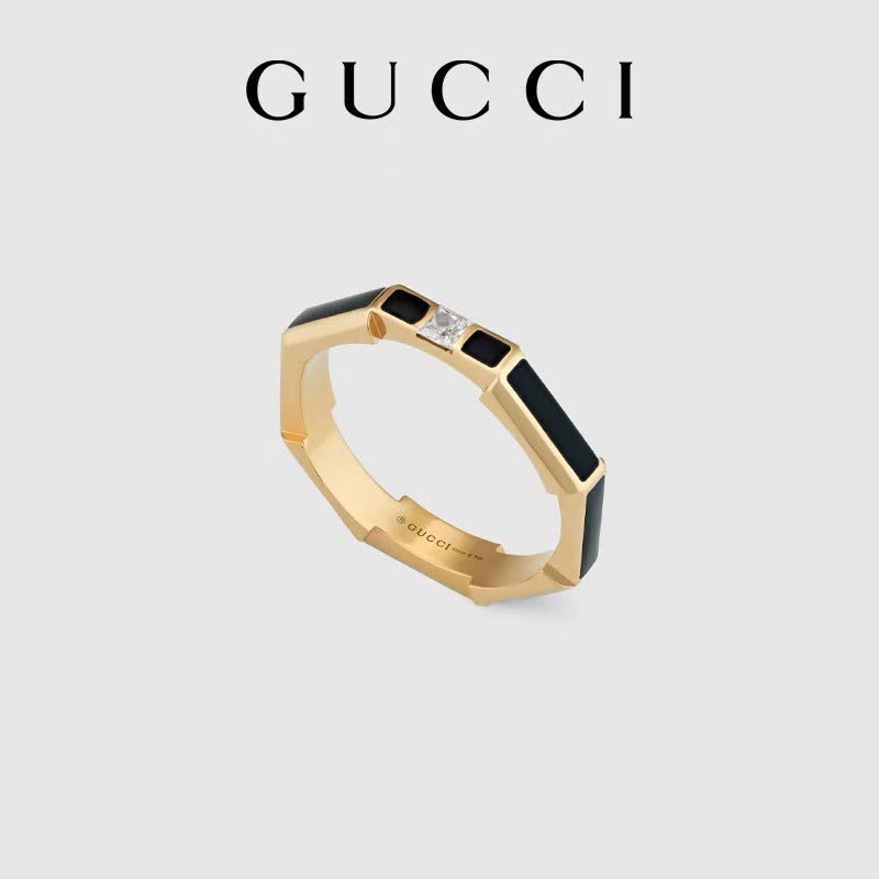 Gucci Gold Ring with Black Enamel and Diamond