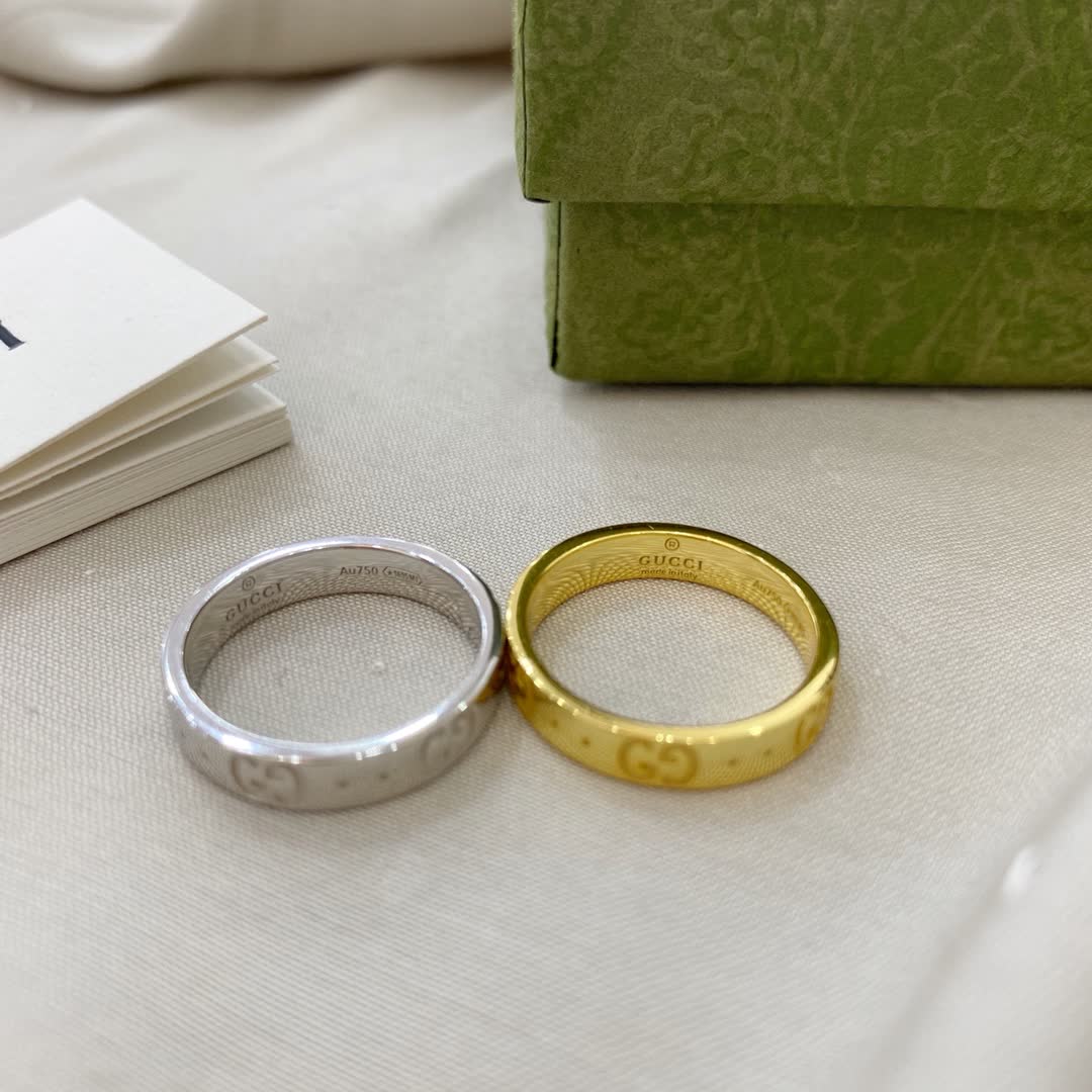 Gucci Gold and Silver Ring Set