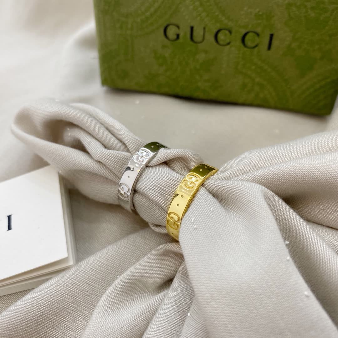 Gucci Gold and Silver Ring Set