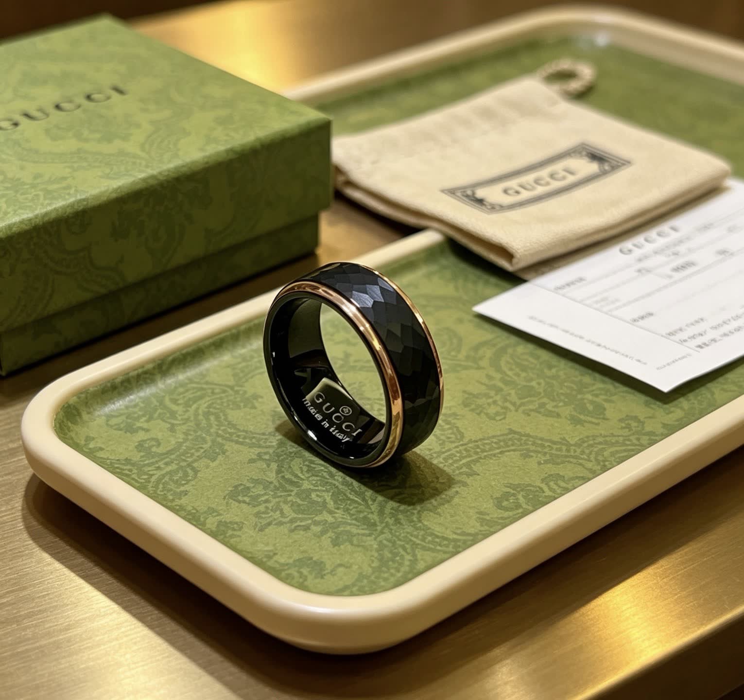 Gucci Black Ceramic Ring with Gold Trim