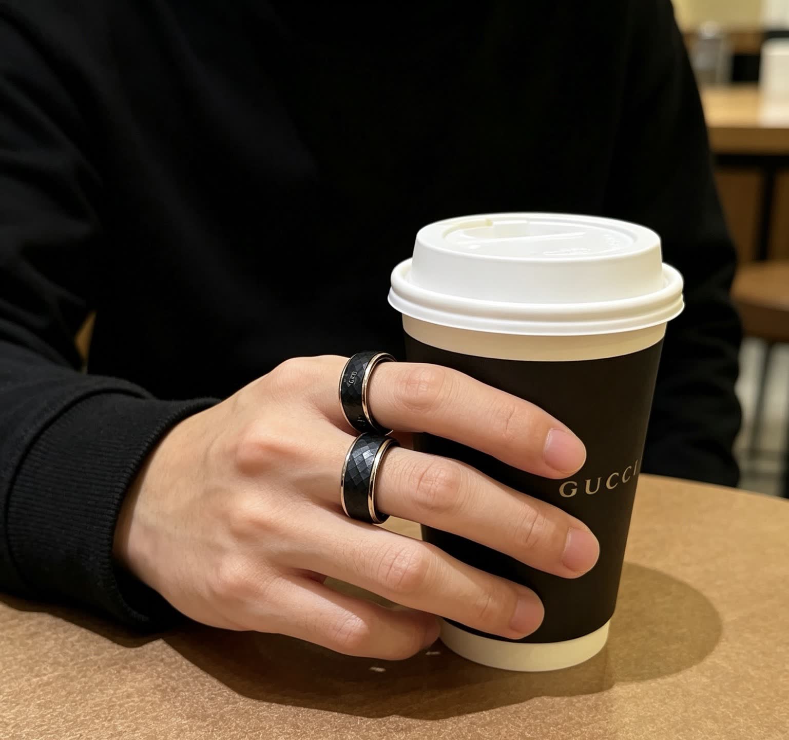 Gucci Black Ceramic Ring with Gold Trim