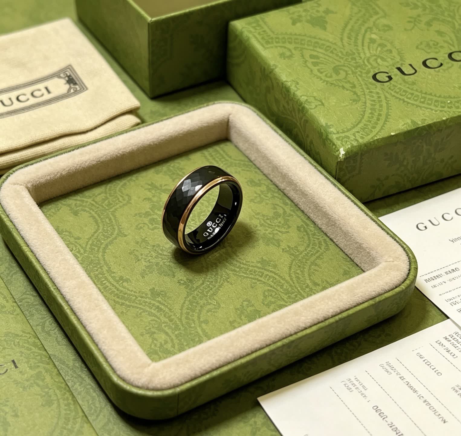 Gucci Black Ceramic Ring with Gold Trim