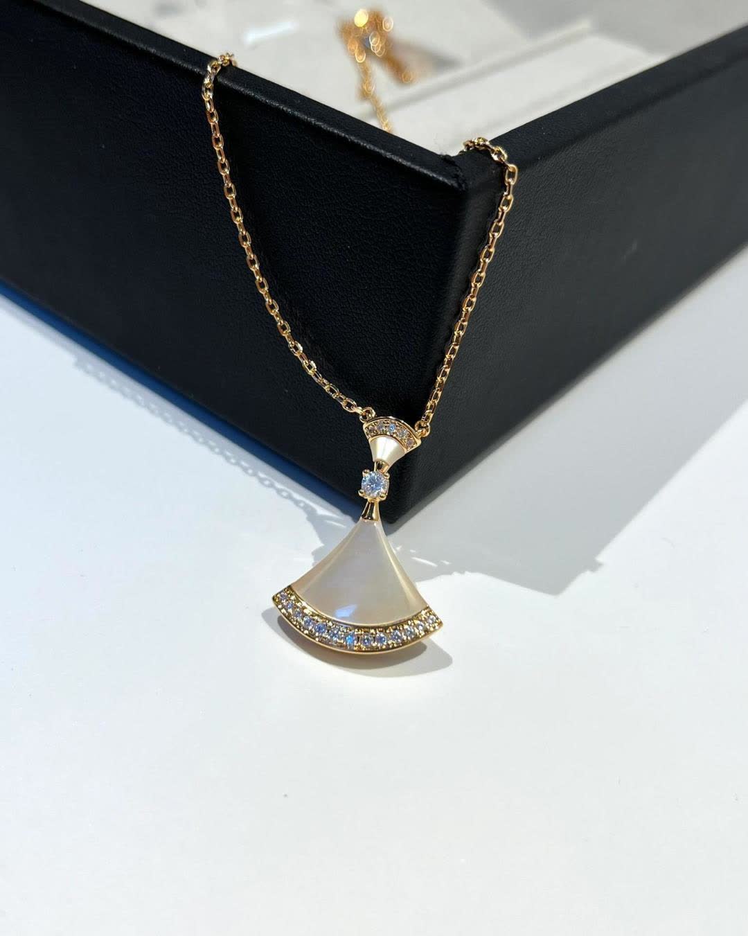 Bvlgari Elegant Gold and Opal Pendant Necklace