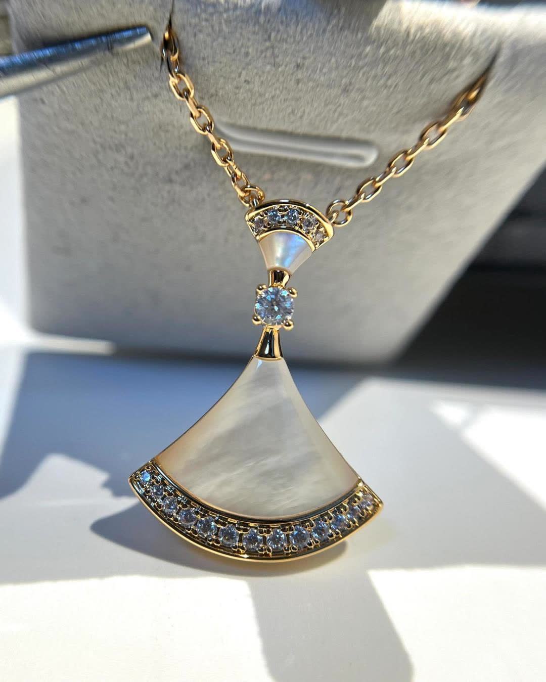 Bvlgari Elegant Gold and Opal Pendant Necklace