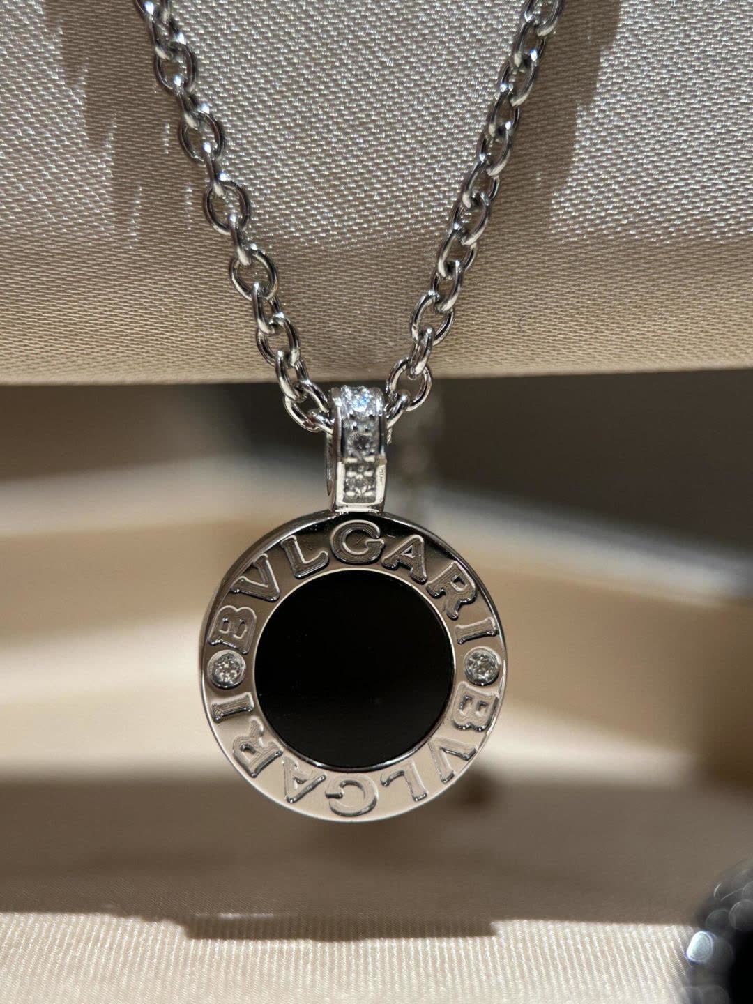 Bvlgari Elegant Silver Chain with Black Gemstone Pendant