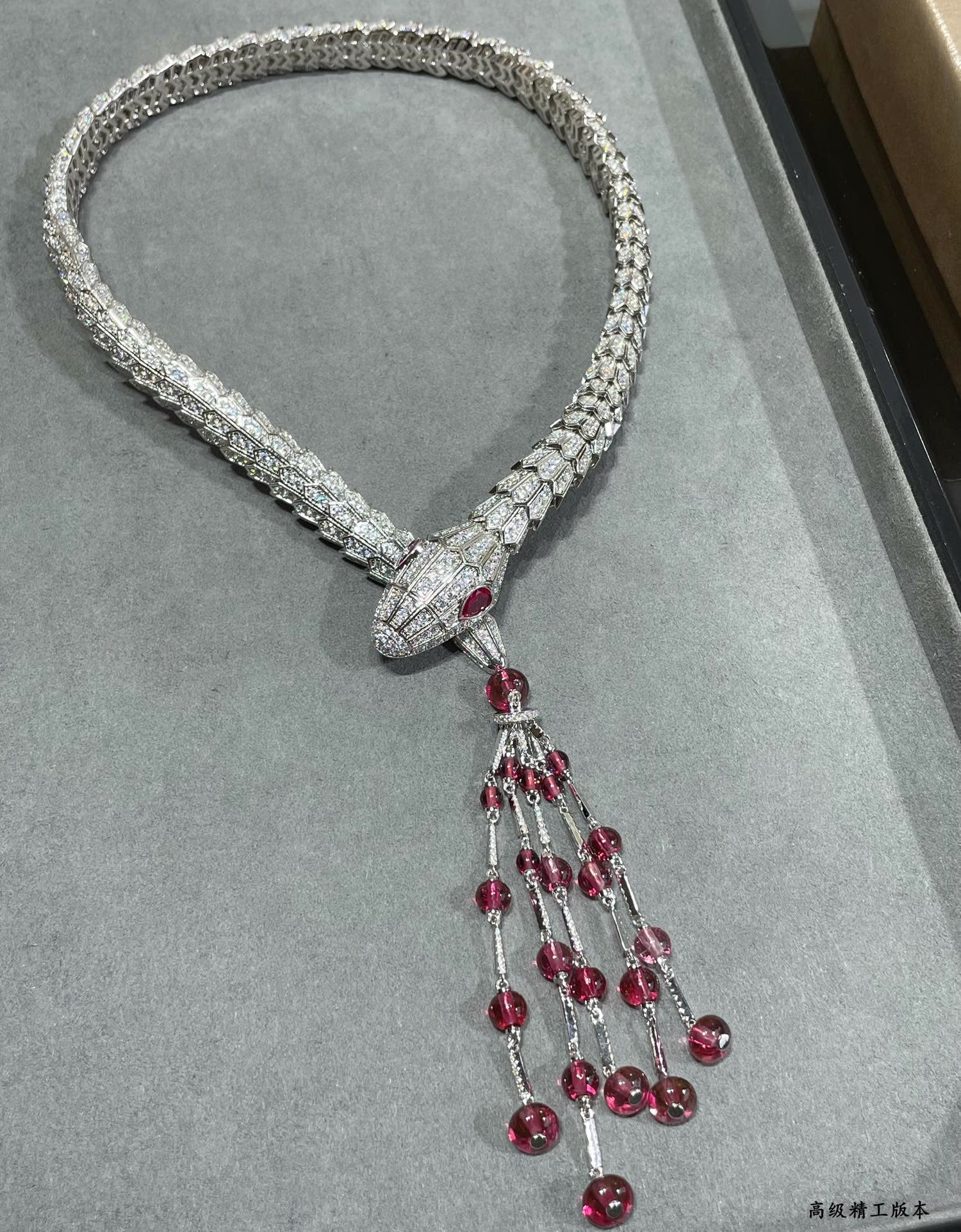 Bvlgari Luxury Silver Snake Necklace with Ruby Tassels