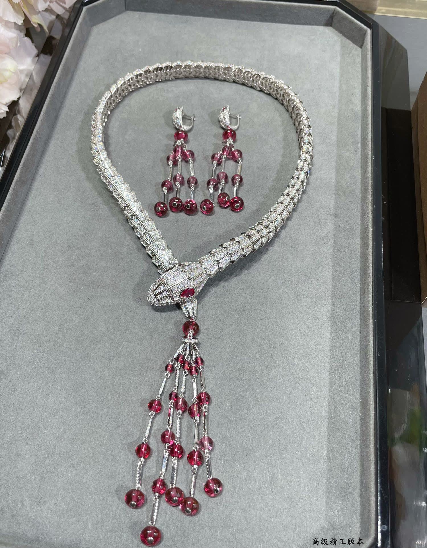 Bvlgari Luxury Silver Snake Necklace with Ruby Tassels
