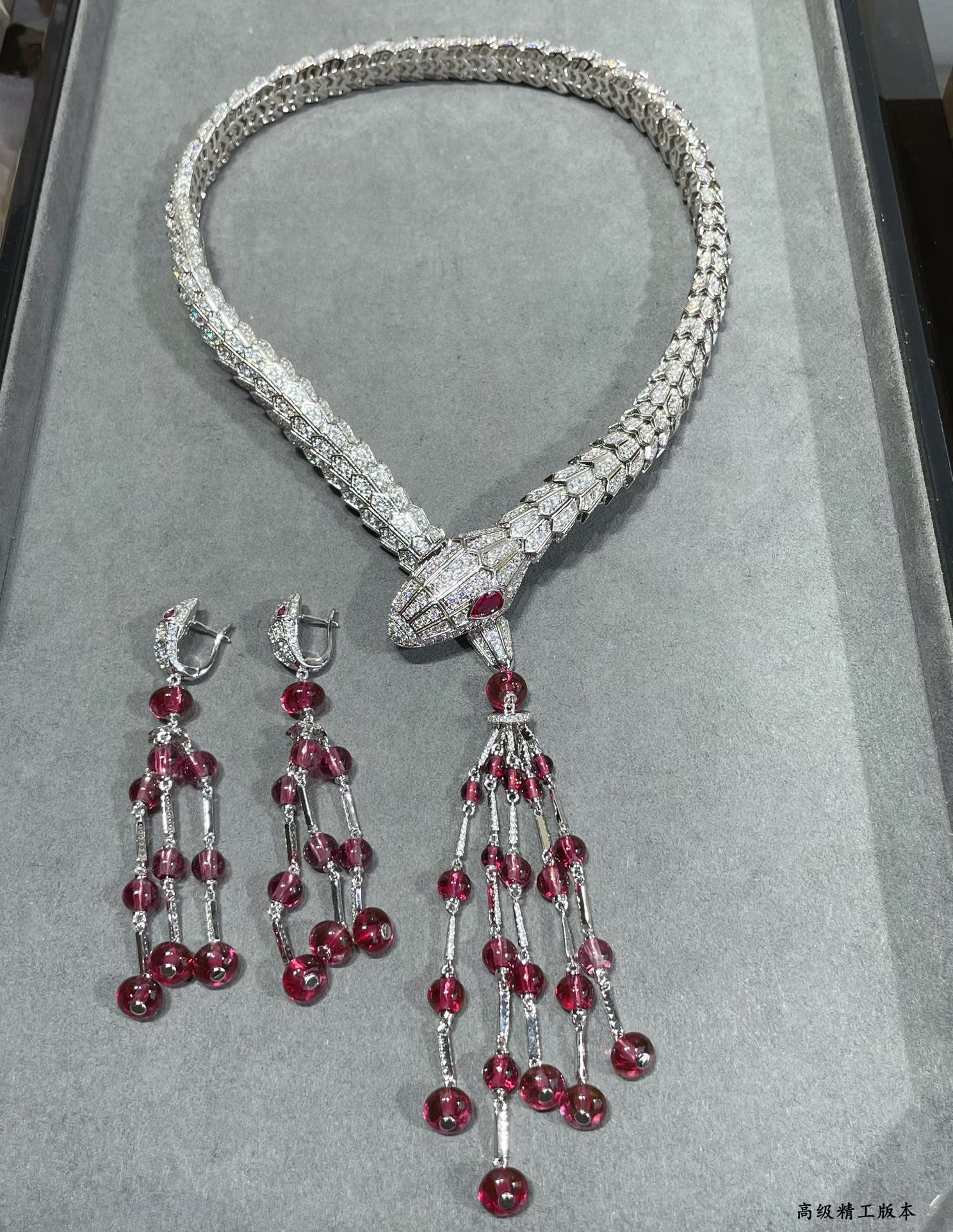 Bvlgari Luxury Silver Snake Necklace with Ruby Tassels