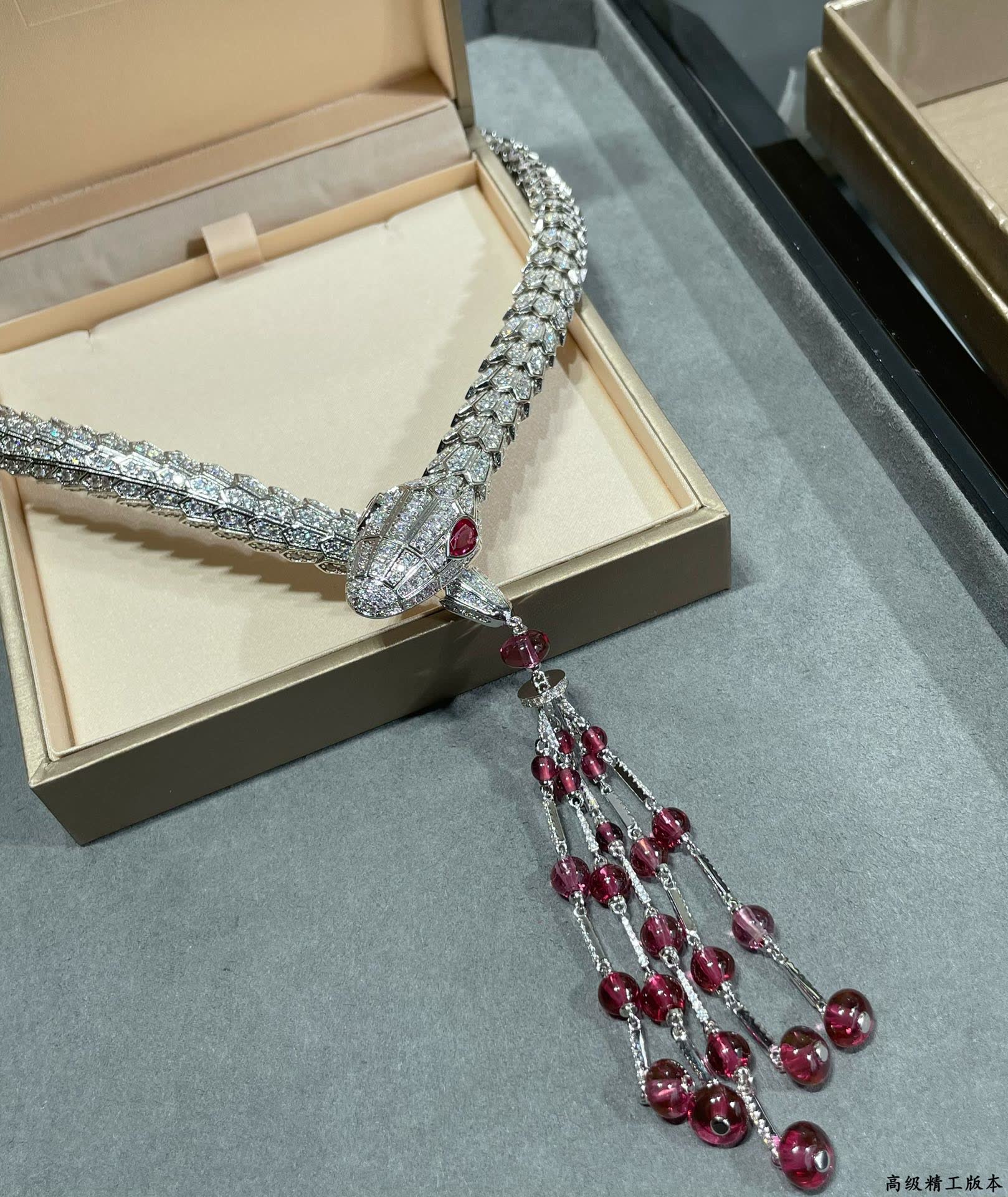 Bvlgari Luxury Silver Snake Necklace with Ruby Tassels