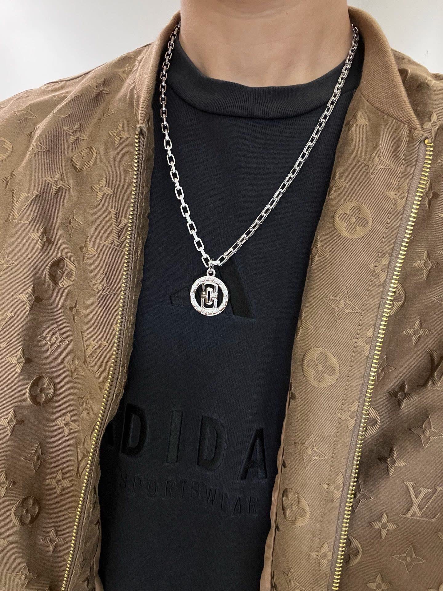 Bvlgari Silver Necklace with Logo Pendant
