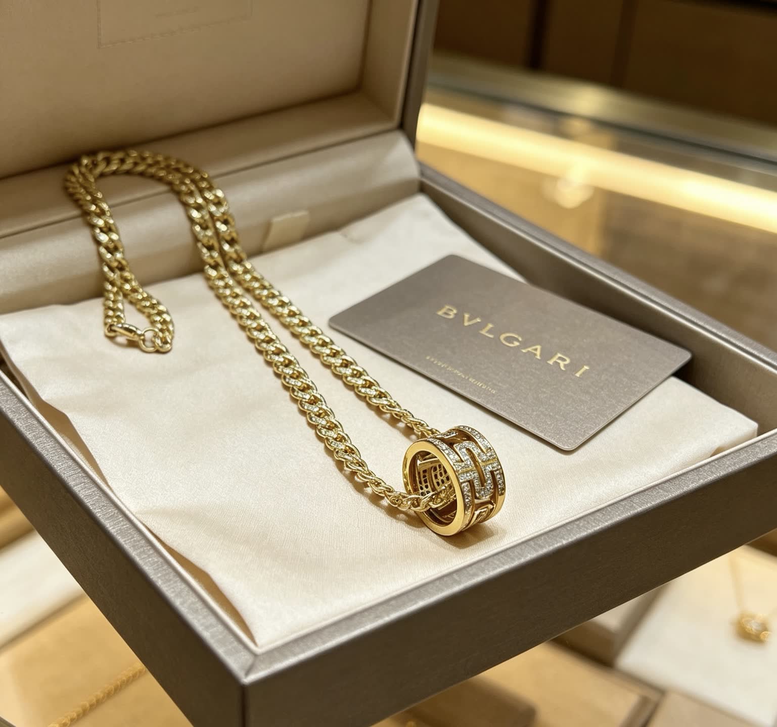 Bvlgari Gold Chain with Diamond Ring Pendant