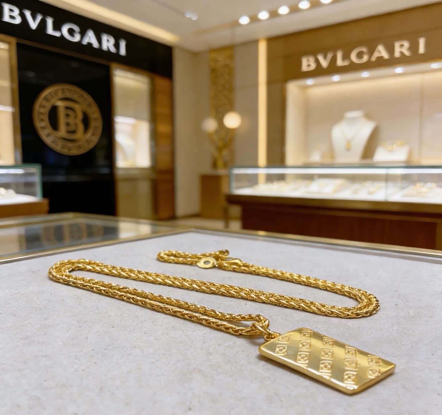 Bvlgari Gold Necklace with Logo Pendant