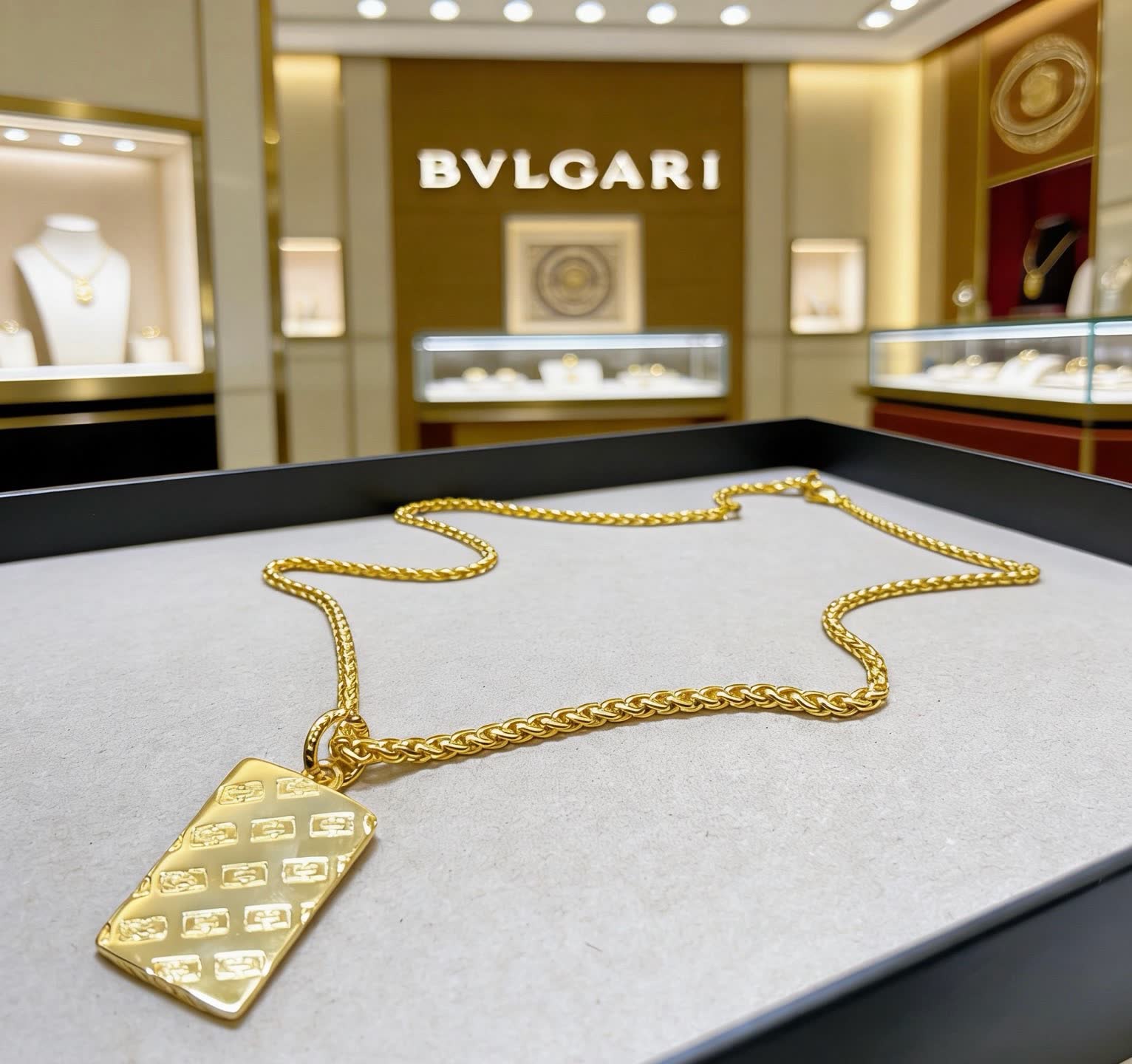 Bvlgari Gold Necklace with Logo Pendant