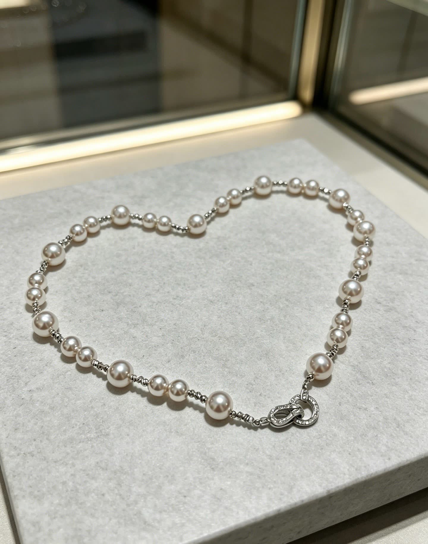 Cartier Elegant Pearl Necklace with Diamond Clasp